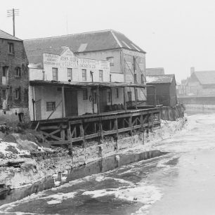 Warehouses on frozen river | Geoff Hastings